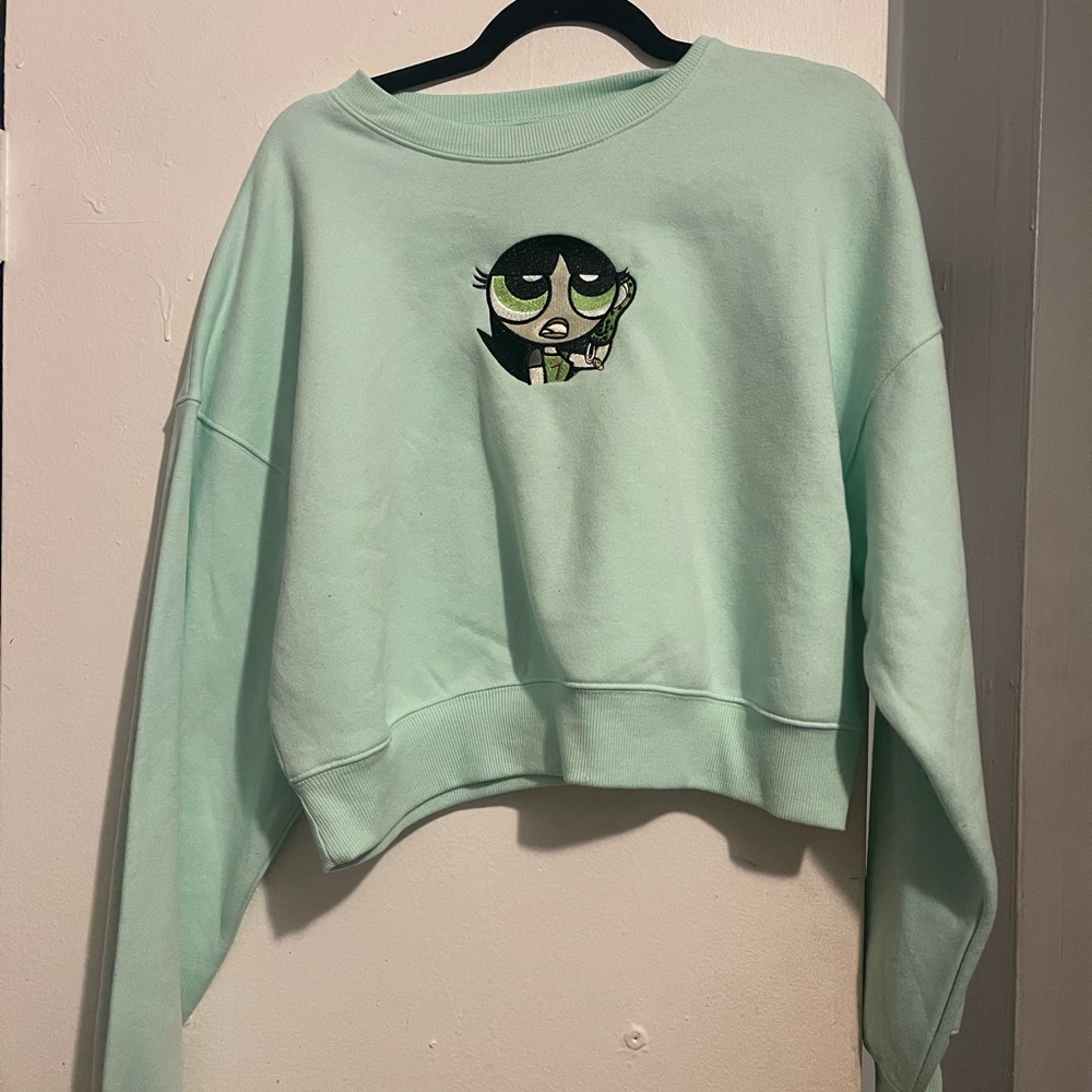 Mint Green Cropped Sweatshirt with Cartoon Graphic